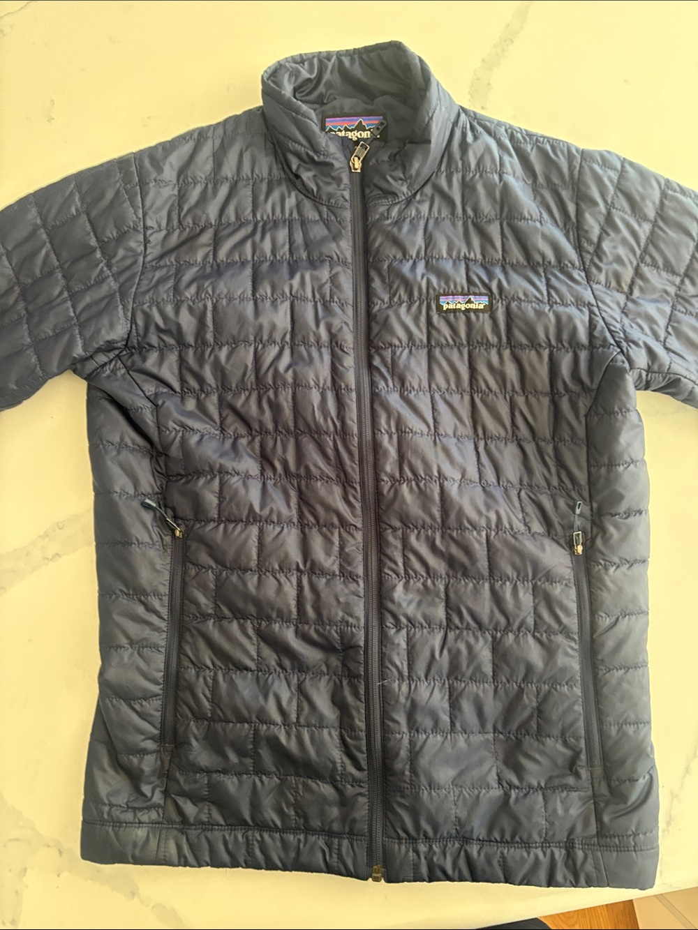 Patagonia Men’s Dark Navy Quilted Puffer Jacket (medium)